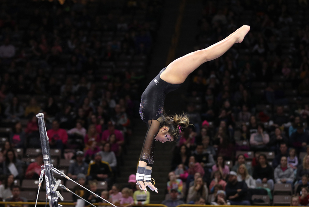 Iowa's Nicole Chow competes on the bars during their meet against the Minnesota Golden Gophers Saturday, January 19, 2019 at Carver-Hawkeye Arena. (Brian Ray/hawkeyesports.com)