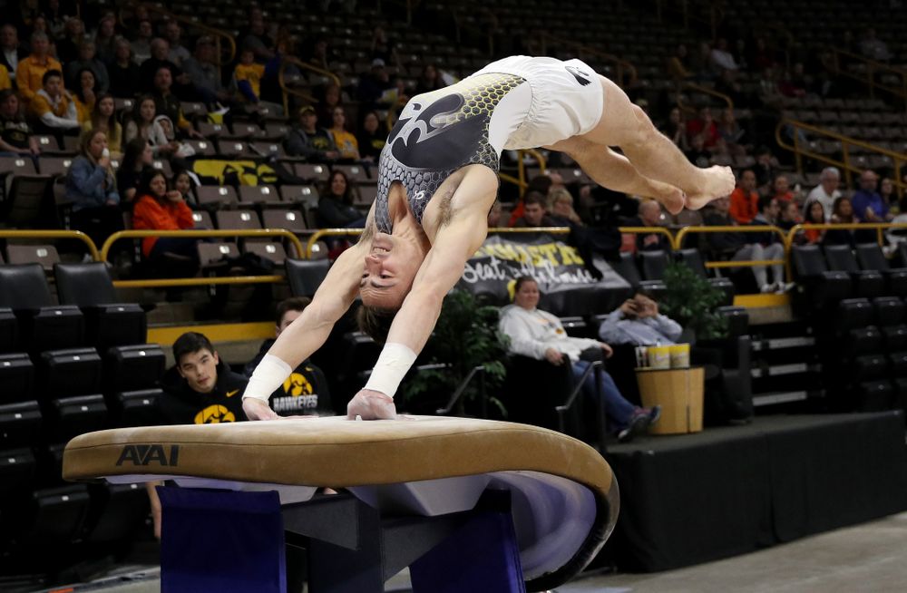 Iowa’s Mitch Mandozzi competes on the vault against Illinois Sunday, March 1, 2020 at Carver-Hawkeye Arena. (Brian Ray/hawkeyesports.com)