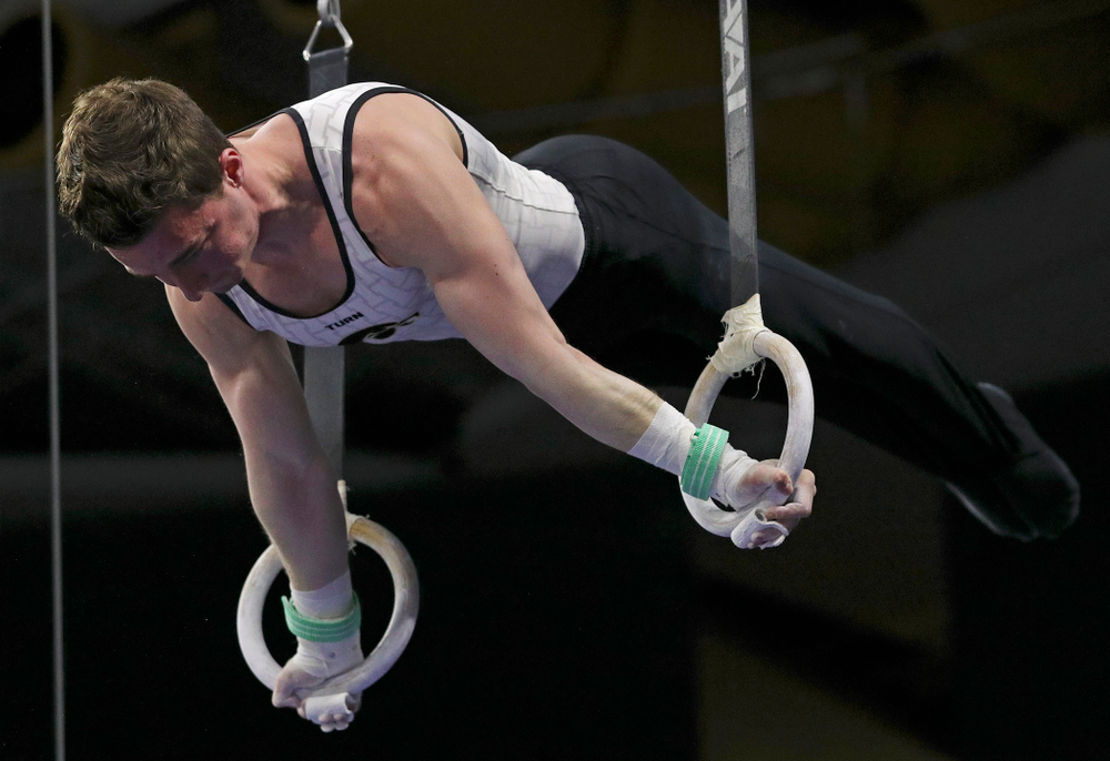 Iowa's Jake Brodarzon competes in the rings during the second day of the Big Ten Men's Gymnastics Championships at Carver-Hawkeye Arena in Iowa City on Saturday, Apr. 6, 2019. (Stephen Mally/hawkeyesports.com)