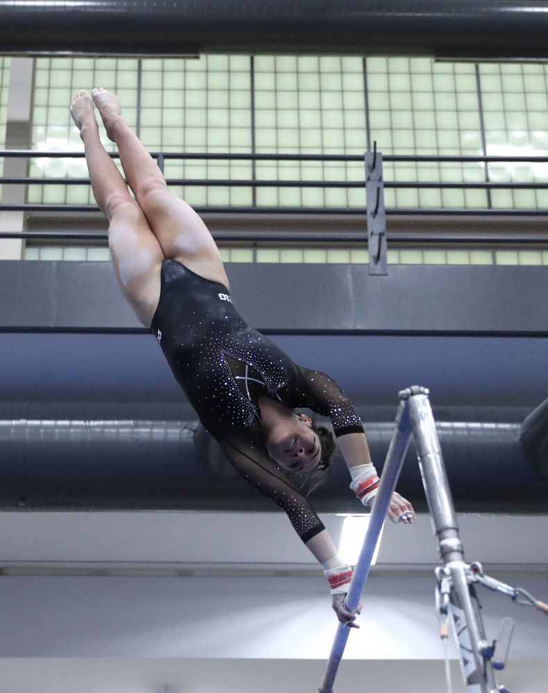 Carina Tolan competes on the bars during the Black and Gold intrasquad meet Saturday, December 1, 2018 at the University of Iowa Field House. (Brian Ray/hawkeyesports.com)