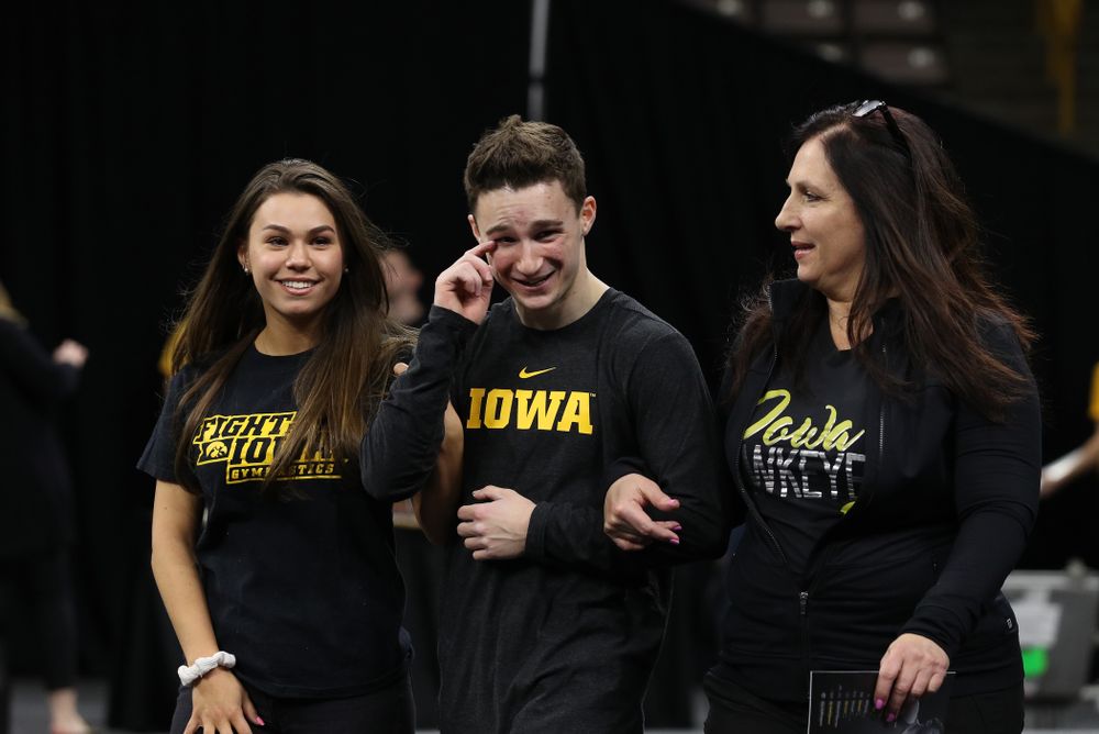 Iowa Men's Gymnast Jake Brodarzon and his family during senior day ceremonies following their meet against the Ohio State Buckeyes Saturday, March 16, 2019 at Carver-Hawkeye Arena. (Brian Ray/hawkeyesports.com)