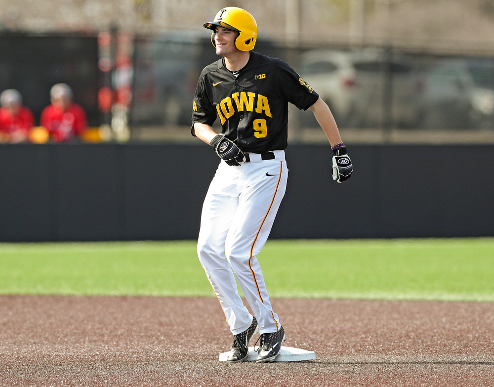Iowa Hawkeyes center fielder Ben Norman (9) dances on second base after hitting an RBI double during the sixth inning of their game against Rutgers at Duane Banks Field in Iowa City on Saturday, Apr. 6, 2019. (Stephen Mally/hawkeyesports.com)