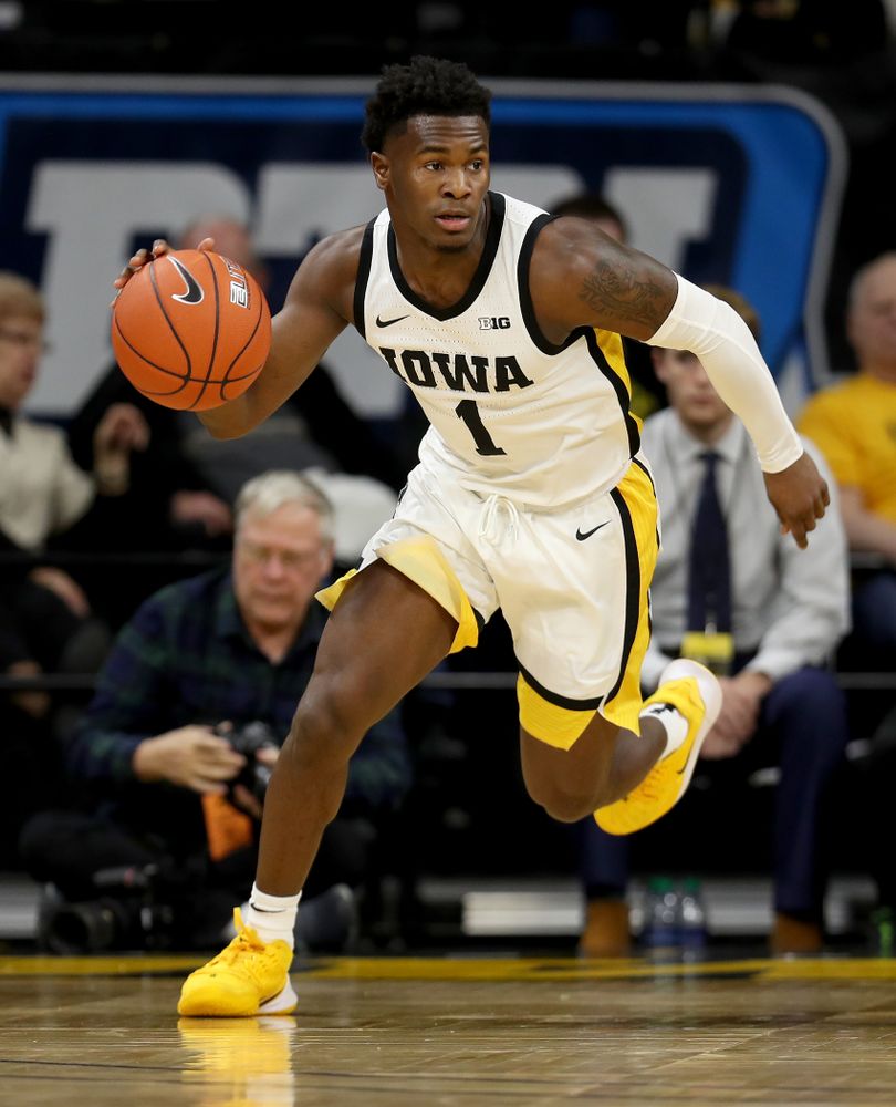 Iowa Hawkeyes guard Joe Toussaint (1) against the Minnesota Golden Gophers Monday, December 9, 2019 at Carver-Hawkeye Arena. (Brian Ray/hawkeyesports.com)