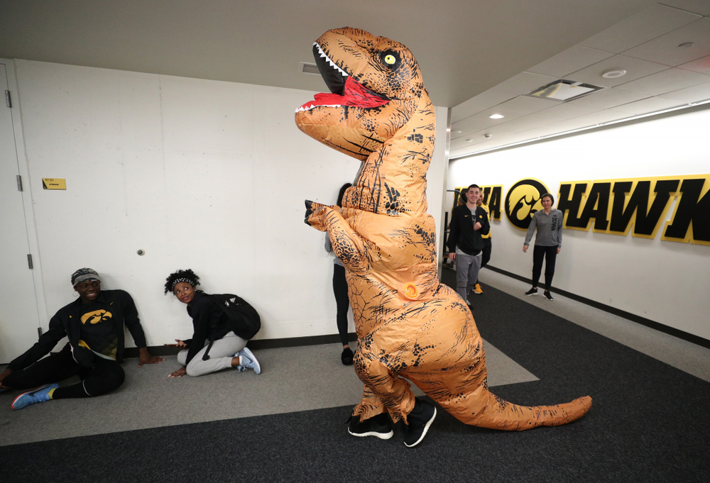 Iowa Hawkeyes head coach Lisa Bluder surprises her team during a workout dressed as a T-Rex for Halloween Wednesday, October 31, 2018 at Carver-Hawkeye Arena. (Brian Ray/hawkeyesports.com)