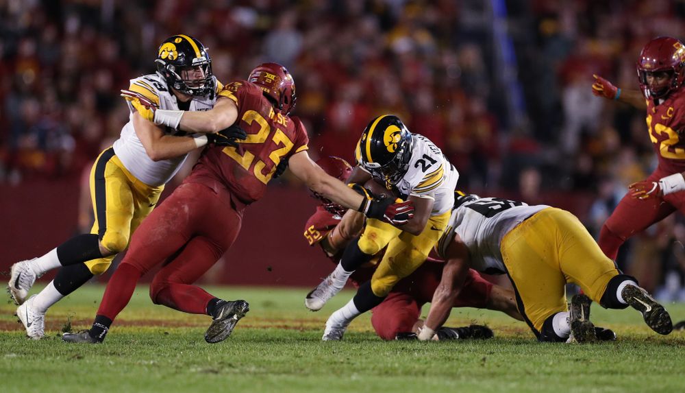 Iowa Hawkeyes running back Ivory Kelly-Martin (21) carries the ball against the Iowa State Cyclones Saturday, September 14, 2019 in Ames, Iowa. (Brian Ray/hawkeyesports.com)
