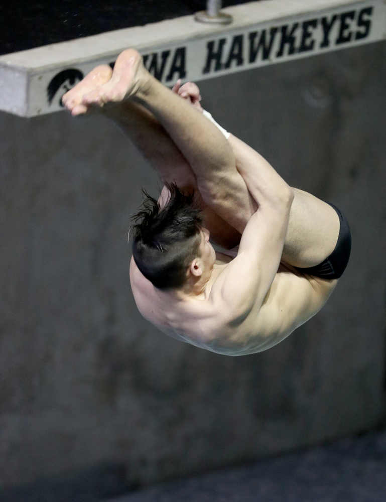 IowaÕs Jonatan Posligua competes on the 1 meter springboard against Notre Dame and Illinois Saturday, January 11, 2020 at the Campus Recreation and Wellness Center. (Brian Ray/hawkeyesports.com)