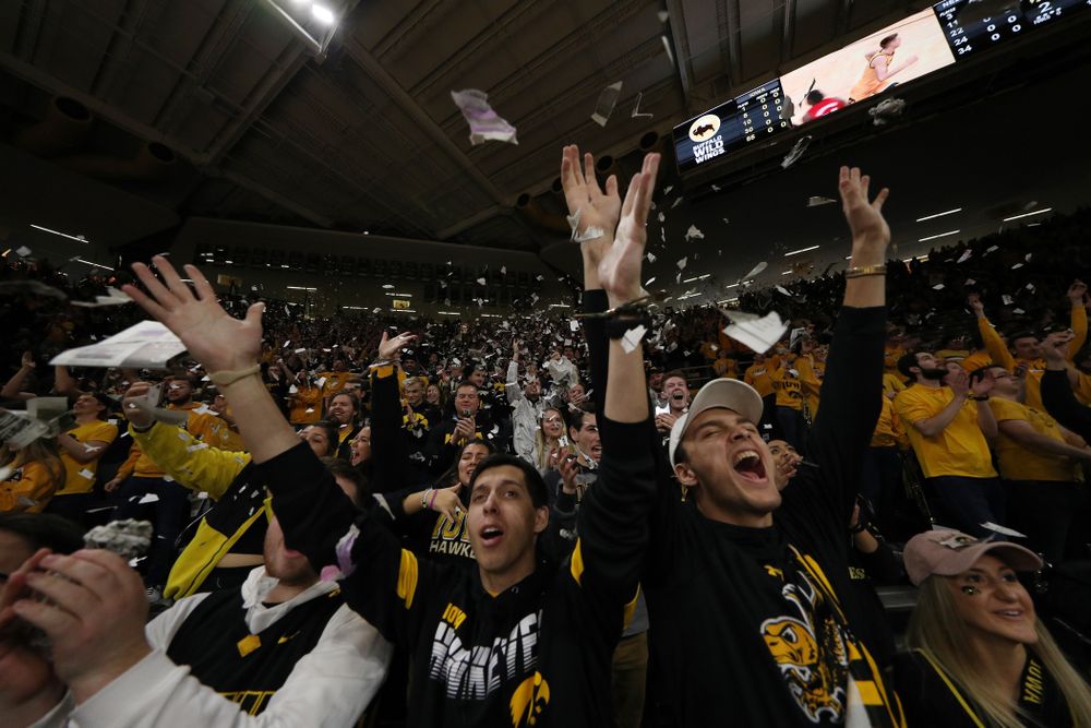 The Hawks Nest throws paper in the air after the Iowa Hawkeyes first basket against the Nebraska Cornhuskers Saturday, February 8, 2020 at Carver-Hawkeye Arena. (Brian Ray/hawkeyesports.com)