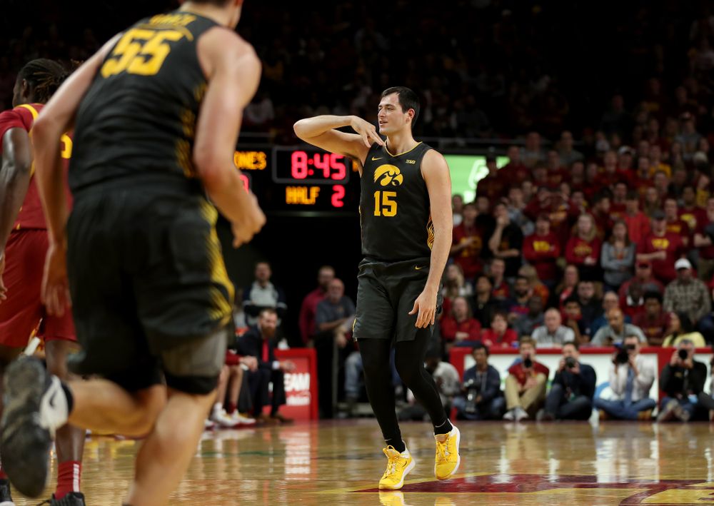 Iowa Hawkeyes forward Ryan Kriener (15) knocks down a three point basket against the Iowa State Cyclones Thursday, December 12, 2019 at Hilton Coliseum in Ames, Iowa(Brian Ray/hawkeyesports.com)