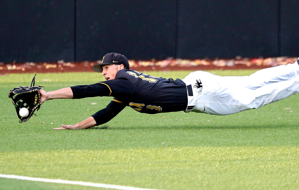 Iowa’s Brayden Frazier (13) dives for a ball during the sixth inning of the first game of the Black and Gold Fall World Series at Duane Banks Field in Iowa City on Tuesday, Oct 15, 2019. (Stephen Mally/hawkeyesports.com)