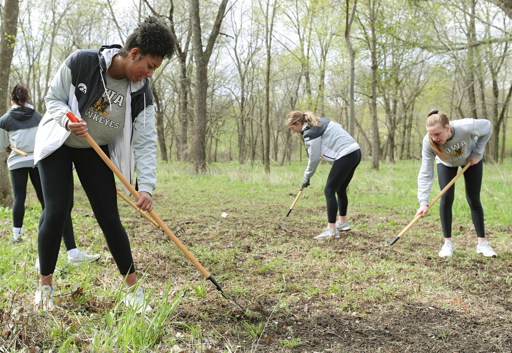 Iowa women's volleyball players prepare the ground for the Woodpecker single track during the 21st annual ISAAC Hawkeye Day of Caring in Coralville on Sunday, Apr. 28, 2019. (Stephen Mally/hawkeyesports.com)