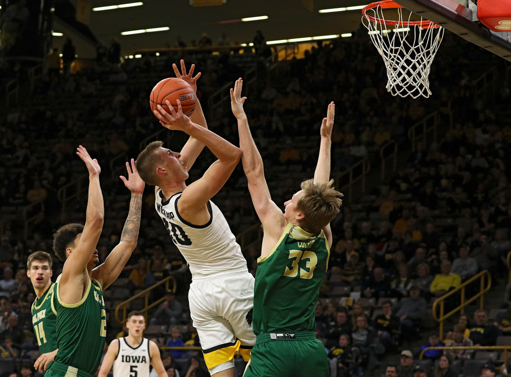 Iowa Hawkeyes guard Joe Wieskamp (10) puts up a shot during the second half of their game at Carver-Hawkeye Arena in Iowa City on Sunday, Nov 24, 2019. (Stephen Mally/hawkeyesports.com)