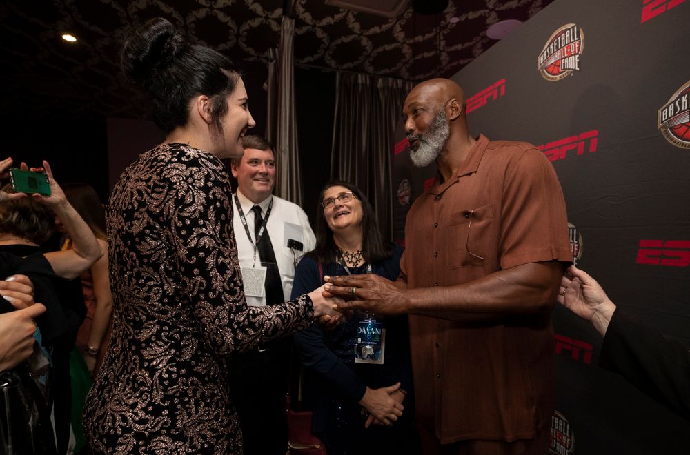 Iowa Hawkeyes forward Megan Gustafson (10) and her family with NBA great Karl Malone before the ESPN College Basketball Awards show Friday, April 12, 2019 at The Novo at LA Live. (Brian Ray/hawkeyesports.com)