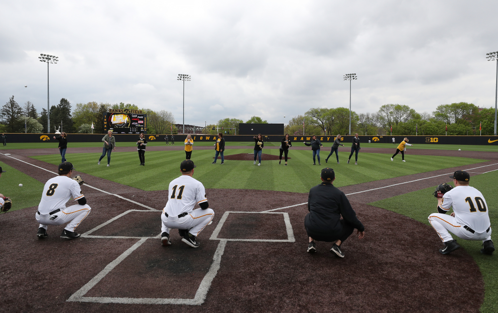 The senior moms throw out a first pitch before their game against Michigan State Sunday, May 12, 2019 at Duane Banks Field. (Brian Ray/hawkeyesports.com)