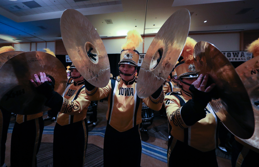 The Hawkeye Marching Band and the Iowa Spirit Squads perform during the Holiday Bowl Hawkeye Huddle Thursday, December 26, 2019 at the Hilton in downtown San Diego. (Brian Ray/hawkeyesports.com)