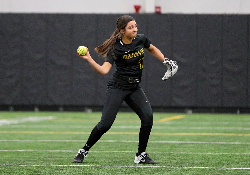 Iowa infielder Nicole Yoder (10) throws to first as they run a drill during Iowa Softball Media Day at the Hawkeye Tennis and Recreation Complex in Iowa City on Thursday, January 30, 2020. (Stephen Mally/hawkeyesports.com)