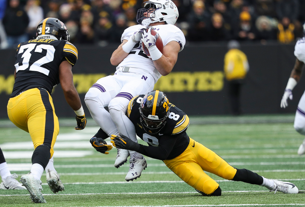 Iowa Hawkeyes defensive back Matt Hankins (8) makes a tackle during a game against Northwestern at Kinnick Stadium on November 10, 2018. (Tork Mason/hawkeyesports.com)