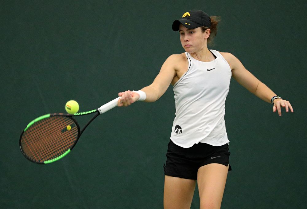 Iowa’s Elise Van Heuvelen returns a shot during her singles match at the Hawkeye Tennis and Recreation Complex in Iowa City on Sunday, February 16, 2020. (Stephen Mally/hawkeyesports.com)