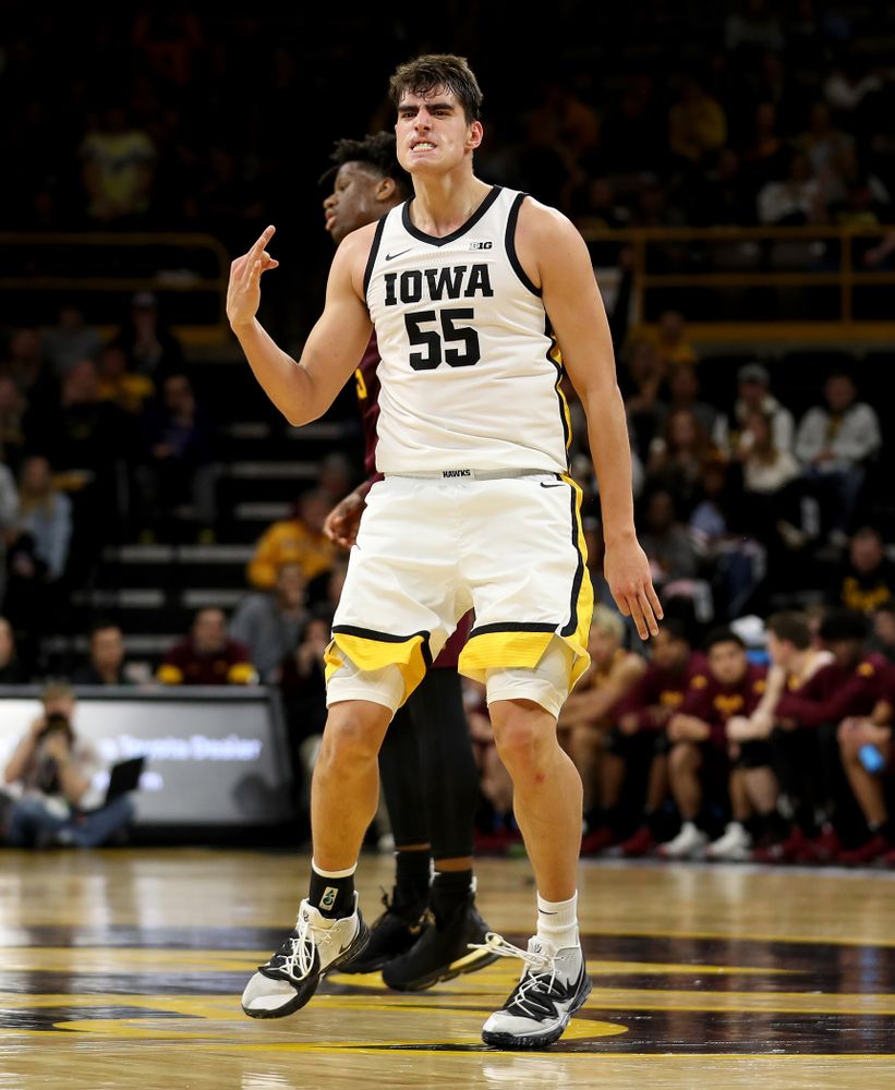 Iowa Hawkeyes forward Luka Garza (55) celebrates a three point basket against the Minnesota Golden Gophers Monday, December 9, 2019 at Carver-Hawkeye Arena. (Brian Ray/hawkeyesports.com)