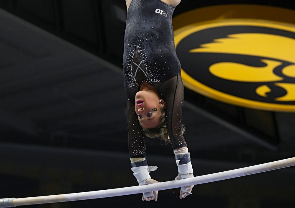Iowa’s Maddie Kampschroder competes on the bars during their meet at Carver-Hawkeye Arena in Iowa City on Sunday, March 8, 2020. (Stephen Mally/hawkeyesports.com)