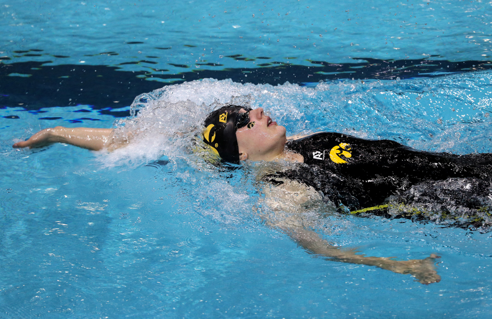 Iowa's Hannah Burvill swims the 100-yard backstroke against the Iowa State Cyclones in the Iowa Corn Cy-Hawk Series Friday, December 7, 2018 at at the Campus Recreation and Wellness Center. (Brian Ray/hawkeyesports.com)
