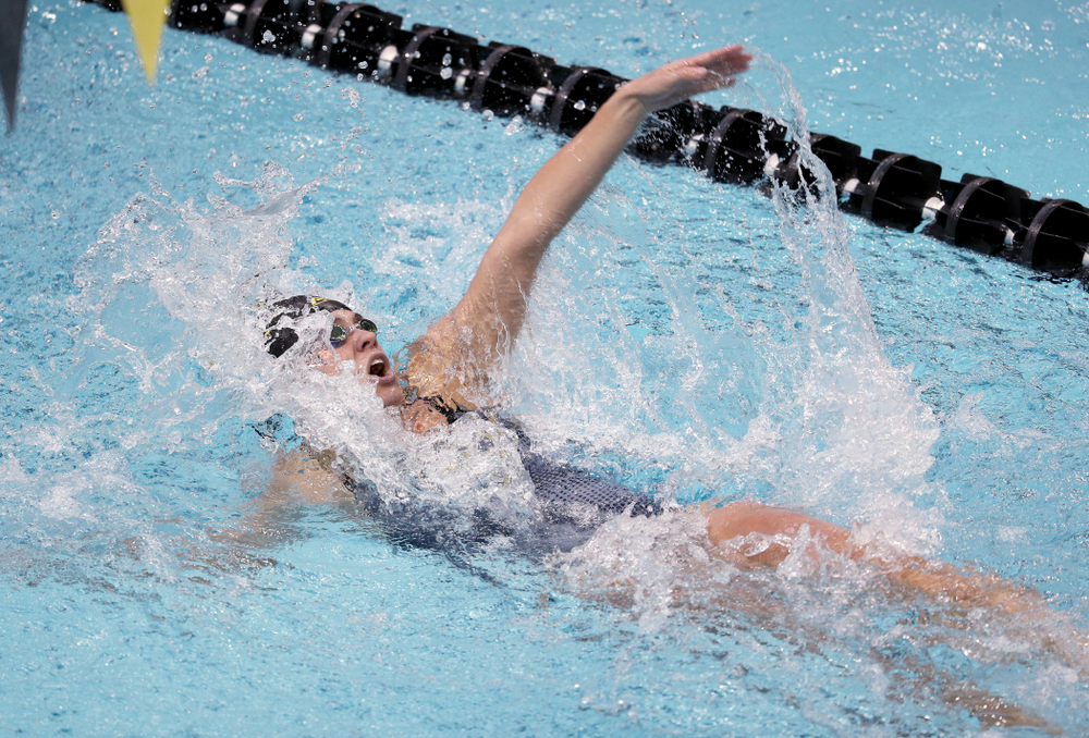 IowaÕs Kennedy Gilbertson competes in the 100 yard backstroke against Notre Dame and Illinois Saturday, January 11, 2020 at the Campus Recreation and Wellness Center. (Brian Ray/hawkeyesports.com)