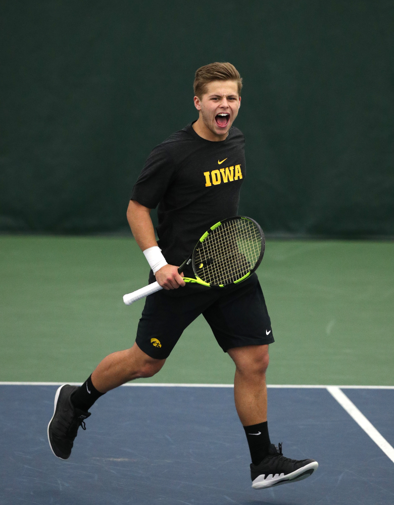 Will Davies and Oliver Okonkwo plays a doubles match against the Miami Hurricanes Friday, February 8, 2019 at the Hawkeye Tennis and Recreation Complex. (Brian Ray/hawkeyesports.com)
