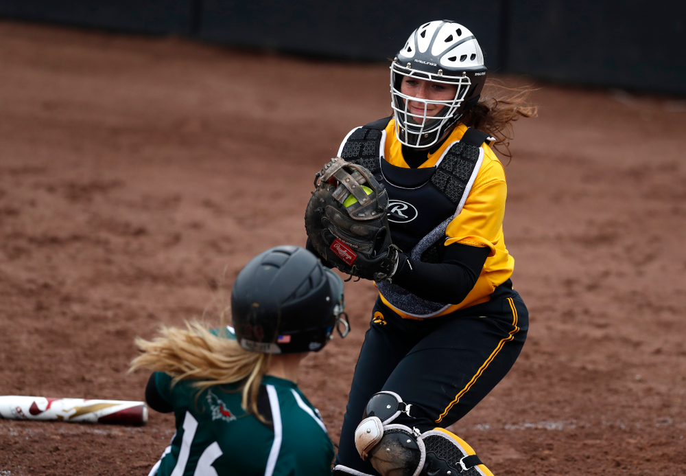 Iowa Hawkeyes catcher Angela Schmiederer (12) against UW Green Bay Tuesday, March 27, 2018 at Bob Pearl Field. (Brian Ray/hawkeyesports.com)