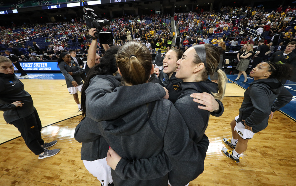 Iowa Hawkeyes forward Amanda Ollinger (43) and forward Hannah Stewart (21) against the NC State Wolfpack in the regional semi-final of the 2019 NCAA Women's College Basketball Tournament Saturday, March 30, 2019 at Greensboro Coliseum in Greensboro, NC.(Brian Ray/hawkeyesports.com)