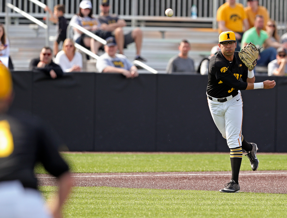 Iowa Hawkeyes third baseman Matthew Sosa (31) throws to first for an out during the seventh inning of their game against Rutgers at Duane Banks Field in Iowa City on Saturday, Apr. 6, 2019. (Stephen Mally/hawkeyesports.com)
