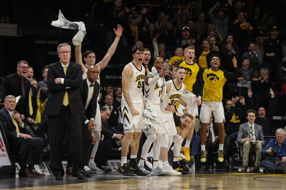 The Iowa Hawkeyes celebrate a three point basket against the Michigan Wolverines Friday, February 1, 2019 at Carver-Hawkeye Arena. (Brian Ray/hawkeyesports.com)