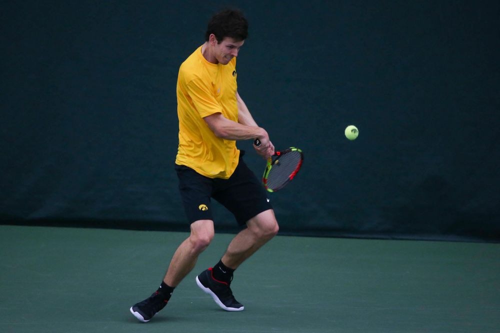 Iowa's Joe Tyler at a tennis match vs Drake Friday, March 8, 2019 at the Hawkeye Tennis and Recreation Complex. (Lily Smith/hawkeyesports.com)