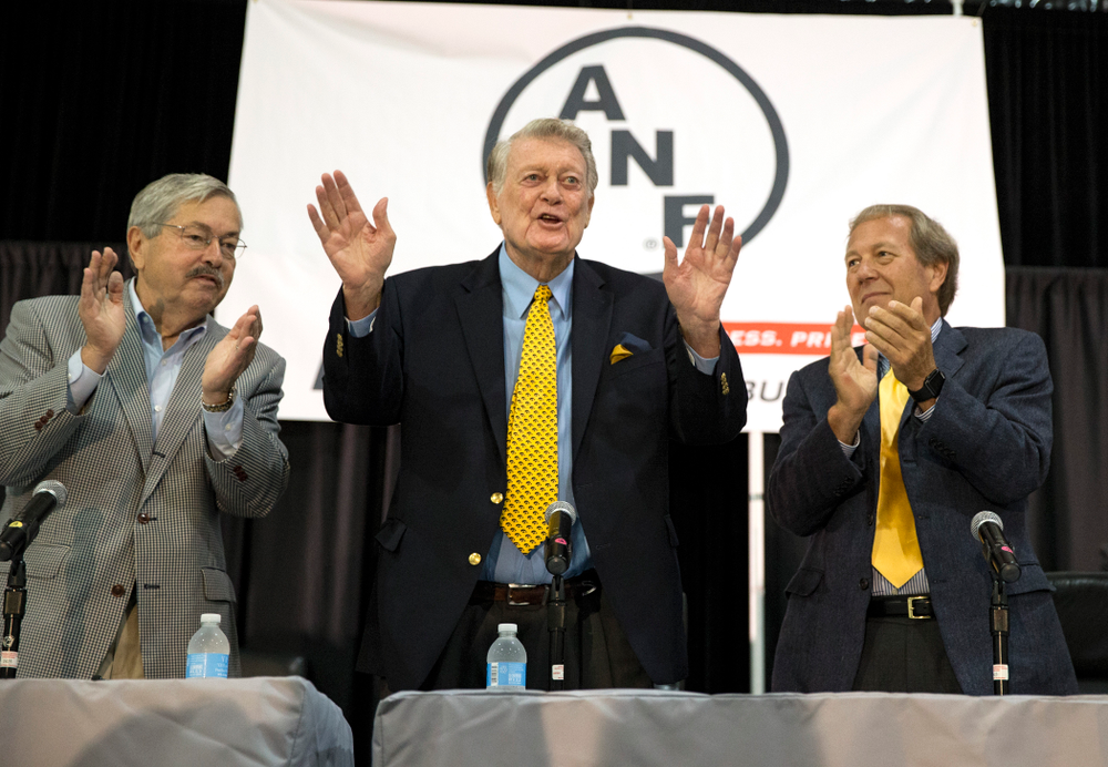 Former Hawkeye Football head coach Hayden Fry stands with new University of Iowa President Bruce Harreld, and Governor Terry Branstad during FryFest Friday, Sept. 4, 2015 at the Coralville Marriott Hotel and Convention Center. Branstad honored Fry with a proclamation commemorating his creation of the ANF logo and his support of Iowa farmers. (Brian Ray/hawkeyesports.com)