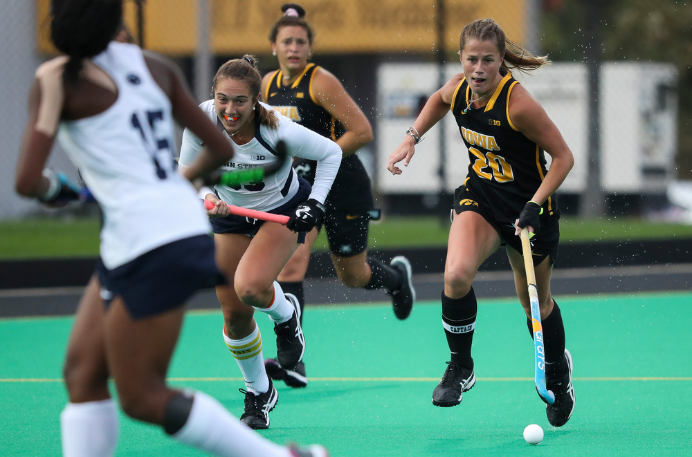 Iowa Hawkeyes midfielder Sophie Sunderland (20) dribbles the ball during a game against No. 6 Penn State at Grant Field on October 12, 2018. (Tork Mason/hawkeyesports.com)