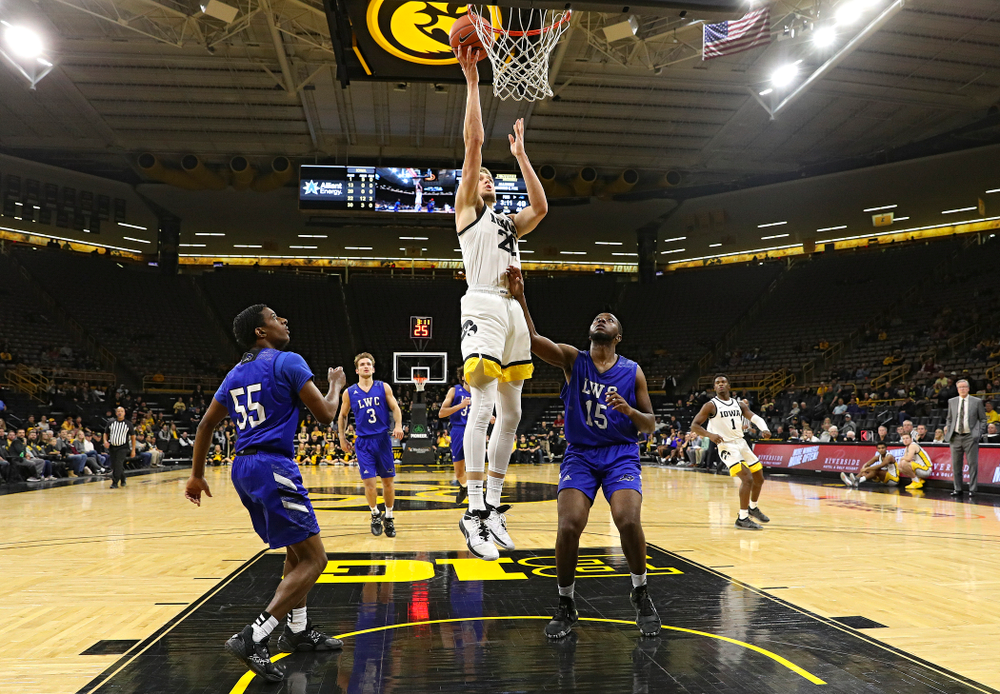 Iowa Hawkeyes forward Riley Till (20) makes a basket during the second half of their exhibition game against Lindsey Wilson College at Carver-Hawkeye Arena in Iowa City on Monday, Nov 4, 2019. (Stephen Mally/hawkeyesports.com)