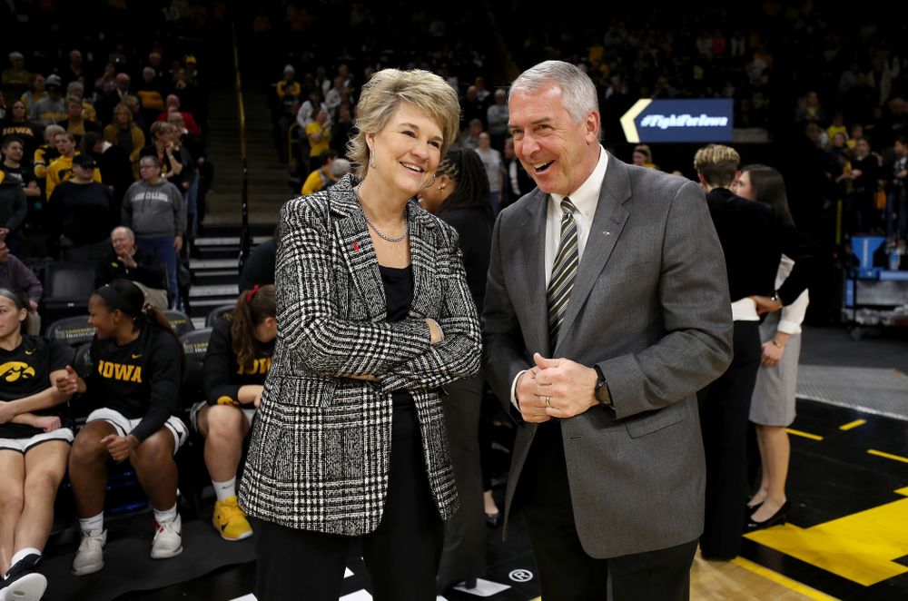 Henry B. and Patricia B. Tippie Director of Athletics Chair Gary Barta talks with Iowa Hawkeyes head coach Lisa Bluder before a ceremony to retire Megan Gustafson’s Jersey Sunday, January 26, 2020 at Carver-Hawkeye Arena. (Brian Ray/hawkeyesports.com)