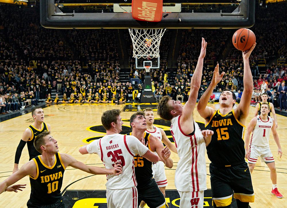 Iowa Hawkeyes forward Ryan Kriener (15) puts up a shot during the second half of their game at Carver-Hawkeye Arena in Iowa City on Monday, January 27, 2020. (Stephen Mally/hawkeyesports.com)