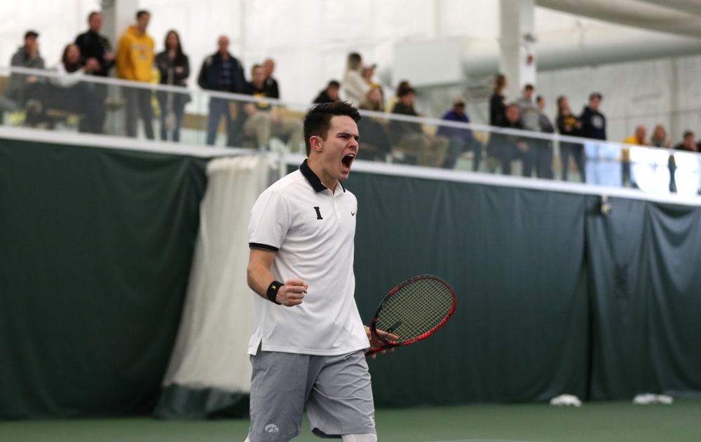Iowa's Jonas Larson celebrates after winning a doubles match with Kareem Allaf against Western Michigan Saturday, January 19, 2019 at the Hawkeye Tennis and Recreation Complex. (Brian Ray/hawkeyesports.com)