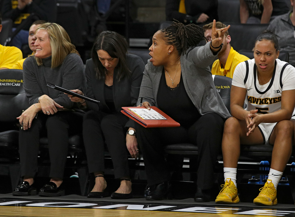 Iowa assistant coach Raina Harmon points during the fourth quarter of their overtime win against Princeton at Carver-Hawkeye Arena in Iowa City on Wednesday, Nov 20, 2019. (Stephen Mally/hawkeyesports.com)