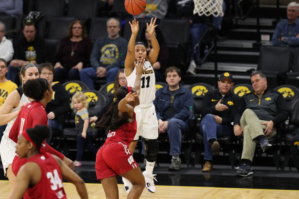 Iowa Hawkeyes guard Tania Davis (11) against the Wisconsin Badgers Monday, January 7, 2019 at Carver-Hawkeye Arena. (Brian Ray/hawkeyesports.com)