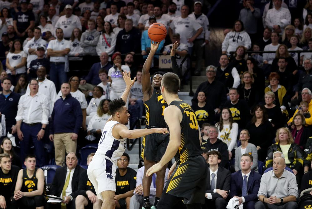 Iowa Hawkeyes guard Joe Toussaint (1) knocks down a three point basket against Penn State Saturday, January 4, 2020 at the Palestra in Philadelphia. (Brian Ray/hawkeyesports.com)