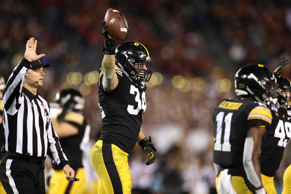 Iowa Hawkeyes linebacker Kristian Welch (34) celebrates after recovering a fumble against USC in the Holiday Bowl Friday, December 27, 2019 at San Diego Community Credit Union Stadium. (Brian Ray/hawkeyesports.com)