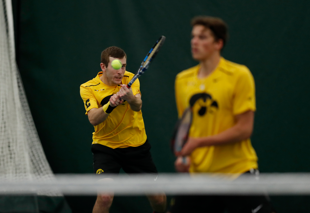 Joe Tyler and Jake Jacoby play a doubles match against the Illinois Fighting Illini Saturday, March 31, 2018 at Hawkeye Tennis and Recreation Center. (Brian Ray/hawkeyesports.com)