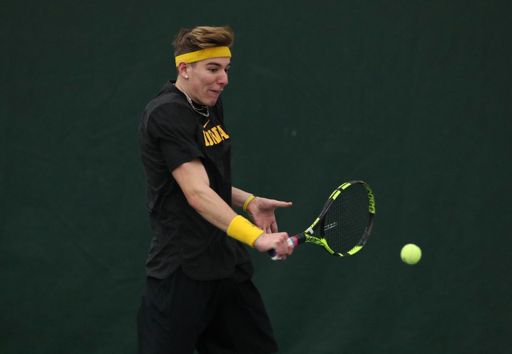 Iowa's Nikita Snezhko against UMKC Friday, February 15, 2019 at the Hawkeye Tennis and Recreation Complex. (Brian Ray/hawkeyesports.com)