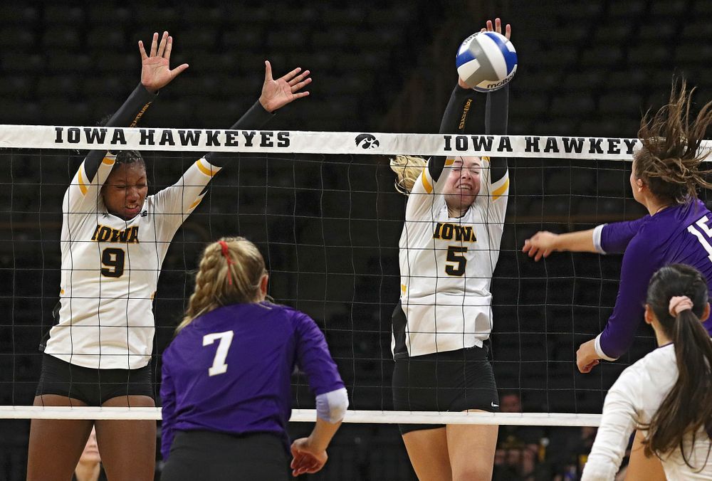Iowa’s Meghan Buzzerio (5) blocks a shot as Amiya Jones (9) looks on during their Big Ten/Pac-12 Challenge match at Carver-Hawkeye Arena in Iowa City on Saturday, Sep 7, 2019. (Stephen Mally/hawkeyesports.com)