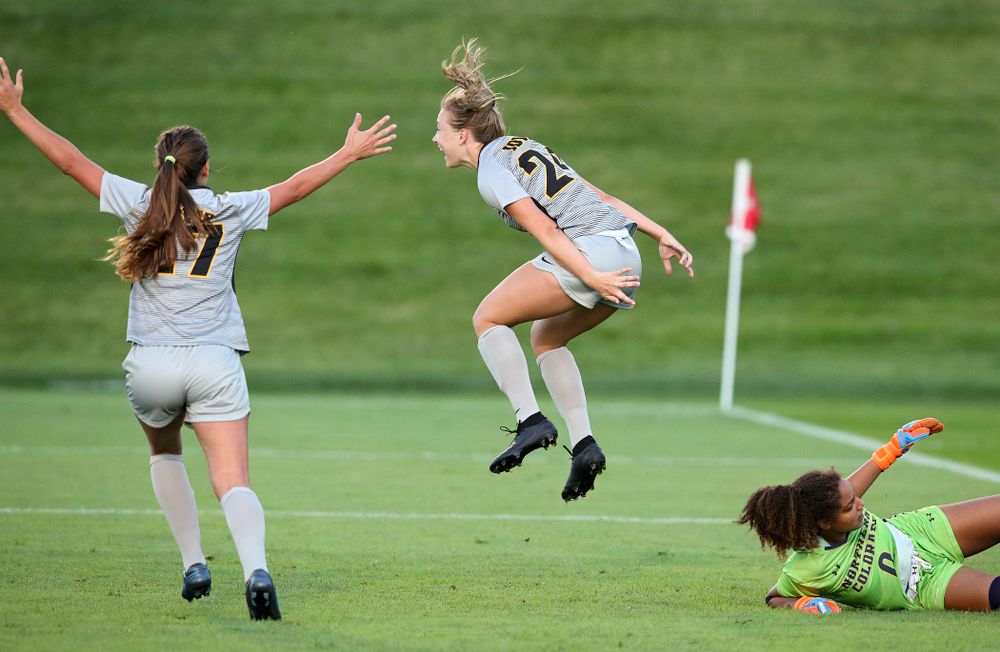 Iowa defender Sara Wheaton (24) celebrates with defender Hannah Drkulec (17) after scoring a goal during the first half of their match at the Iowa Soccer Complex in Iowa City on Friday, Sep 13, 2019. (Stephen Mally/hawkeyesports.com)