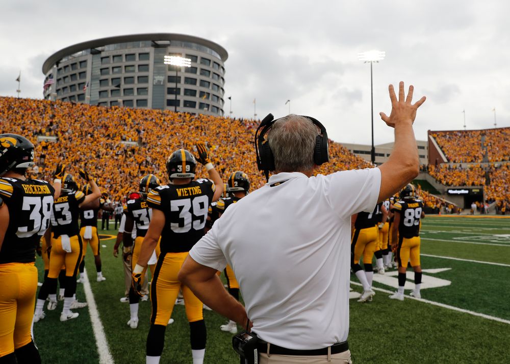 Iowa Hawkeyes head coach Kirk Ferentz waves to the Stead Family Children's Hospital during their game against the Northern Illinois Huskies Saturday, September 1, 2018 at Kinnick Stadium. (Brian Ray/hawkeyesports.com)