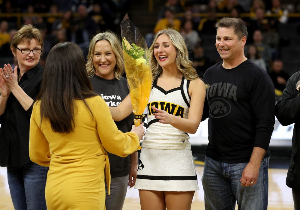 The Iowa Cheerleaders and Dance Team perform on senior night at half-time of the Iowa Hawkeyes game against the Purdue Boilermakers Tuesday, March 3, 2020 at Carver-Hawkeye Arena. (Brian Ray/hawkeyesports.com)