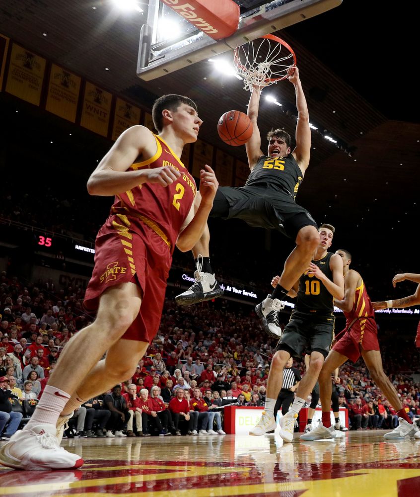 Iowa Hawkeyes forward Luka Garza (55) dunks the ball against the Iowa State Cyclones Thursday, December 12, 2019 at Hilton Coliseum in Ames, Iowa(Brian Ray/hawkeyesports.com)