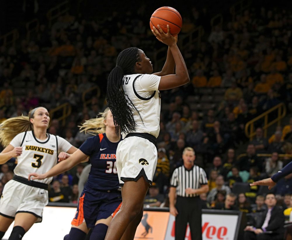 Iowa Hawkeyes guard Tomi Taiwo (1) scores a basket inside during the third quarter of their game at Carver-Hawkeye Arena in Iowa City on Tuesday, December 31, 2019. (Stephen Mally/hawkeyesports.com)