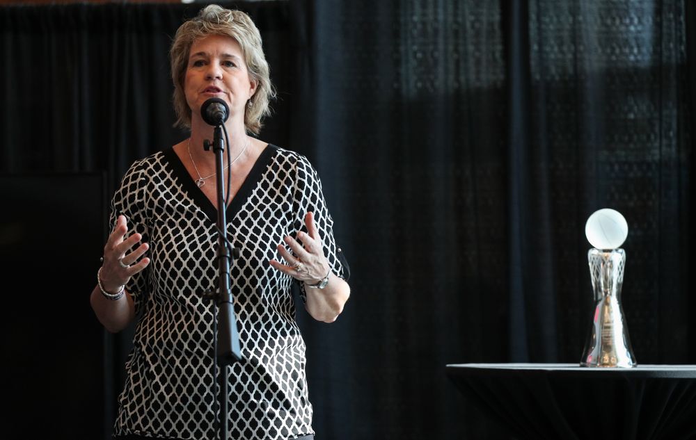 Iowa Hawkeyes head coach Lisa Bluder introduces forward Megan Gustafson (10) during a news conference to announce that Gustafson had won the AP Player of the Year. Wednesday, April 4, 2018 at Amalie Arena in Tampa, FL. (Brian Ray/hawkeyesports.com)